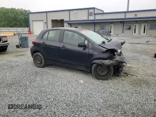 2009 Toyota Yaris with VIN JTDKT903095243922, listed as a Copart auction lot 51293545 with 196,909 mi miles and Salvage Title. Bid and sale history available at carsss.com. Image 11.