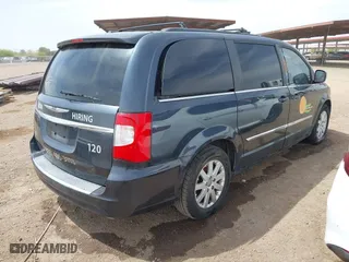 2014 Chrysler Town & Country Touring with VIN 2C4RC1BGXER111473, listed as a IAAI auction lot 41946581 with 303,547 mi miles. Bid and sale history available at carsss.com. Image 4.