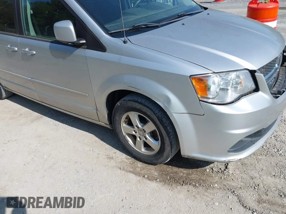 2012 Dodge Grand Caravan SXT with VIN 2C4RDGCG0CR284124, listed as a IAAI auction lot 42103224 with 131,691 mi miles and . Bid and sale history available at DreamBid. Image 18.