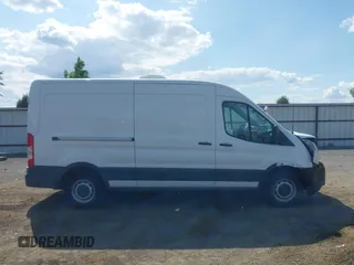 2019 Ford Transit z VIN 1FTYR2CM7KKB83987, wystawiony jako IAAI lot #42442070 z przebiegiem 77 492 mil mil oraz . Historia ofert i sprzedaży dostępna na DreamBid. Obrazek 13.