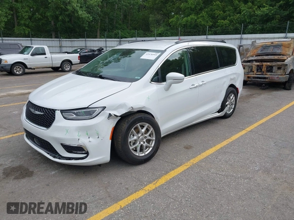 2022 Chrysler Pacifica Touring L with VIN 2C4RC1BG3NR149675, listed as a IAAI auction lot 42470593 with 59,956 mi miles and . Bid and sale history available at DreamBid. Image 18.