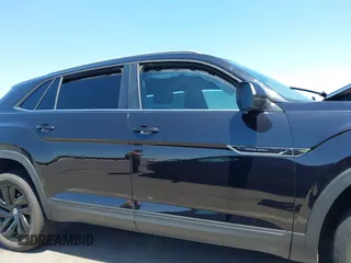 2022 Volkswagen Atlas SE z VIN 1V2KE2CA8NC220310, wystawiony jako IAAI lot #42218718 z przebiegiem 28 603 mil mil oraz . Historia ofert i sprzedaży dostępna na DreamBid. Obrazek 13.