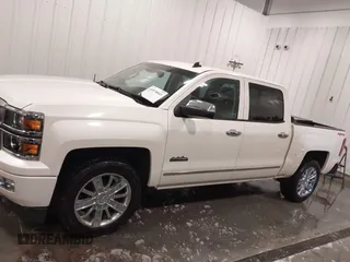 2014 Chevrolet Silverado 1500 High Country with VIN 3GCUKTEC4EG527722, listed as a IAAI auction lot 41978841 with 104,492 mi miles and . Bid and sale history available at DreamBid. Image 14.