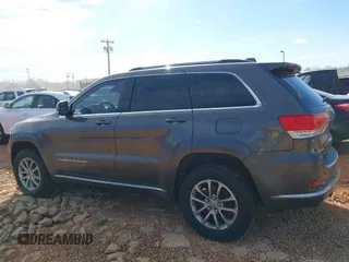2015 Jeep Grand Cherokee Summit with VIN 1C4RJFJG8FC679185, listed as a IAAI auction lot 41653531 with 158,186 mi miles and . Bid and sale history available at DreamBid. Image 15.