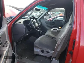 2000 Ford F-150 XL with VIN 1FTRX18W6YNC32005, listed as a Copart auction lot 82169314 with 289,320 mi miles and Salvage Title. Bid and sale history available at carsss.com. Image 7.