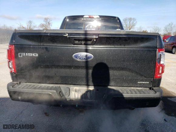 2015 Ford F-150 XLT w/HD Payload Pkg with VIN 1FTFW1EF8FKD63767, listed as a Copart auction lot 87078584 with 136,306 mi miles and Salvage Title. Bid and sale history available at carsss.com. Image 6.