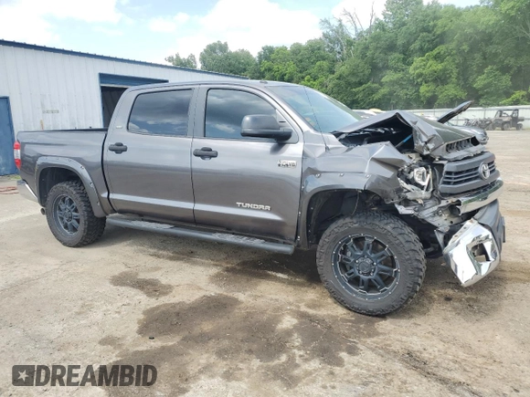 2014 Toyota Tundra 4WD Truck SR5 with VIN 5TFDW5F17EX410516, listed as a Copart auction lot 54867235 with 220,651 mi miles and Salvage Title. Bid and sale history available at carsss.com. Image 4.