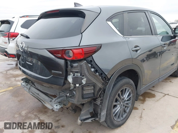 2021 Mazda CX-5 Touring with VIN JM3KFBCM0M0342210, listed as a IAAI auction lot 41236013 with 96,012 mi miles. Bid and sale history available at carsss.com. Image 6.