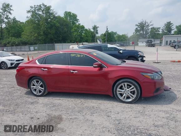 2016 Nissan Altima SL z VIN 1N4BL3AP3GC142130, wystawiony jako IAAI lot #42431687 z przebiegiem 120 986 mil mil oraz . Historia ofert i sprzedaży dostępna na DreamBid. Obrazek 13.