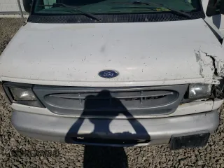 1999 Ford Econoline Cargo with VIN 1FTRE142XXHB29496, listed as a Copart auction lot 64516444 with 206,951 mi miles and Salvage Title. Bid and sale history available at carsss.com. Image 12.