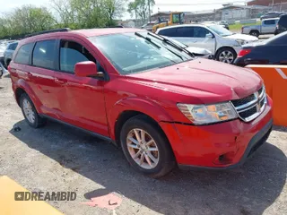 2016 Dodge Journey SXT with VIN 3C4PDDBG5GT149862, listed as a IAAI auction lot 42082364 with 233,440 mi miles. Bid and sale history available at carsss.com. Image 1.