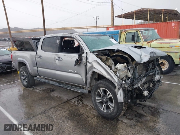 2018 Toyota Tacoma SR5 with VIN 3TMBZ5DN0JM012259, listed as a IAAI auction lot 41709709 with Not provided miles and . Bid and sale history available at DreamBid. Image 1.