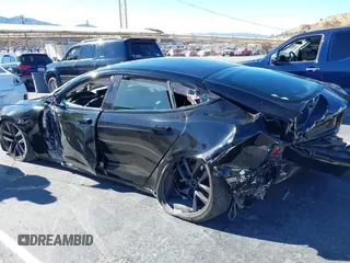 2022 Tesla Model S with VIN 5YJSA1E52NF476906, listed as a IAAI auction lot 41320074 with Not Provided miles and . Bid and sale history available at DreamBid. Image 3.
