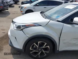 2019 Toyota C-HR XLE with VIN JTNKHMBX9K1054053, listed as a IAAI auction lot 42120256 with 67,083 mi miles and . Bid and sale history available at DreamBid. Image 19.