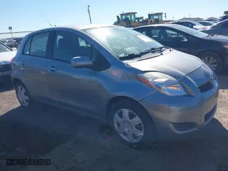 2010 Toyota Yaris with VIN JTDKT4K38A5285260, listed as a IAAI auction lot 41476373 with 104,358 mi miles. Bid and sale history available at carsss.com. Image 1.