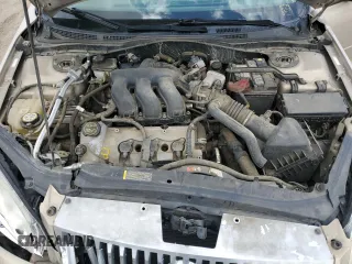 2008 Mercury Milan Premier z VIN 3MEHM08148R639125, wystawiony jako Copart lot #56798705 z przebiegiem 115 428 mil mil oraz Szkoda całkowita • Salvage title. Historia ofert i sprzedaży dostępna na DreamBid. Obrazek 11.
