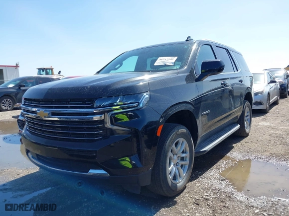 2024 Chevrolet Tahoe LT with VIN 1GNSKNKD6RR302151, listed as a IAAI auction lot 41717741 with 21,929 mi miles. Bid and sale history available at carsss.com. Image 2.
