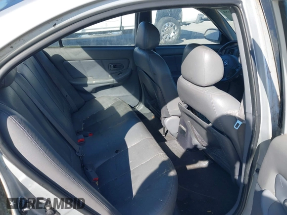 2004 Hyundai Elantra GLS z VIN KMHDN46D64U796686, wystawiony jako IAAI lot #42306228 z przebiegiem Nie podano mil oraz . Historia ofert i sprzedaży dostępna na DreamBid. Obrazek 8.