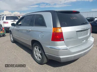 2004 Chrysler Pacifica z VIN 2C8GM684X4R646959, wystawiony jako IAAI lot #40324831 z przebiegiem 163 289 mil mil oraz . Historia ofert i sprzedaży dostępna na DreamBid. Obrazek 3.