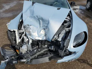 2015 Aston Martin Vantage z VIN SCFEKBAK2FGC19462, wystawiony jako Copart lot #61093934 z przebiegiem 53 068 mil mil oraz Szkoda całkowita • Salvage title. Historia ofert i sprzedaży dostępna na DreamBid. Obrazek 11.