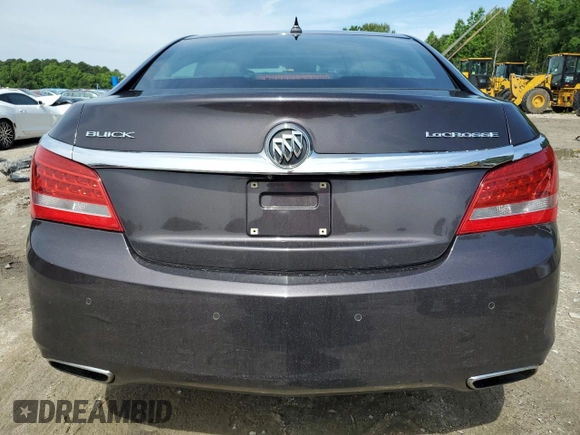 2014 Buick LaCrosse Premium II with VIN 1G4GF5G3XEF129714, listed as a Copart auction lot 58734075 with 140,024 mi miles and Salvage title. Bid and sale history available at DreamBid. Image 6.