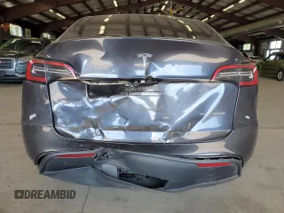 2024 Tesla Model Y Long Range z VIN 7SAYGDEE2RA246928, wystawiony jako Copart lot #60996035 z przebiegiem 19 266 mil mil oraz Szkoda całkowita • Salvage title. Historia ofert i sprzedaży dostępna na DreamBid. Obrazek 6.