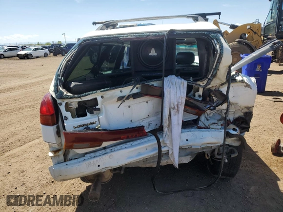 1999 Subaru Legacy Outback with VIN 4S3BG6855X7645042, listed as a Copart auction lot 55452095 with 159,874 mi miles and Salvage title. Bid and sale history available at DreamBid. Image 6.