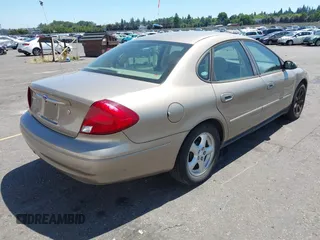 2002 Ford Taurus SE Standard with VIN 1FAFP53U62G142287, listed as a IAAI auction lot 42653173 with 58,388 mi miles and . Bid and sale history available at DreamBid. Image 4.
