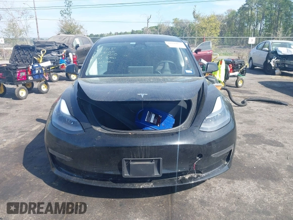 2023 Tesla Model 3 with VIN 5YJ3E1EA3PF681515, listed as a IAAI auction lot 41899053 with 15,985 mi miles and . Bid and sale history available at carsss.com. Image 12.
