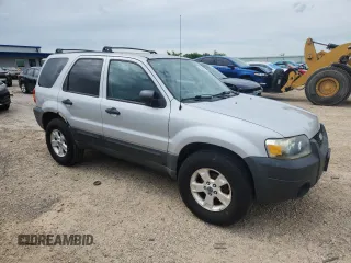 2005 Ford Escape XLT with VIN 1FMYU031X5KE02367, listed as a Copart auction lot 62699145 with 127,734 mi miles and Non repairable. Bid and sale history available at DreamBid. Image 4.