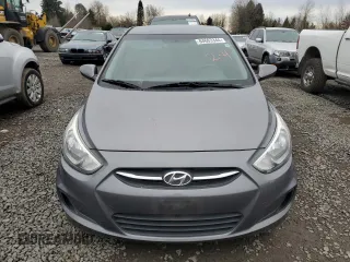 2015 Hyundai Accent GLS with VIN KMHCT4AEXFU817530, listed as a Copart auction lot 84663344 with 125,410 mi miles and Salvage Title. Bid and sale history available at carsss.com. Image 5.