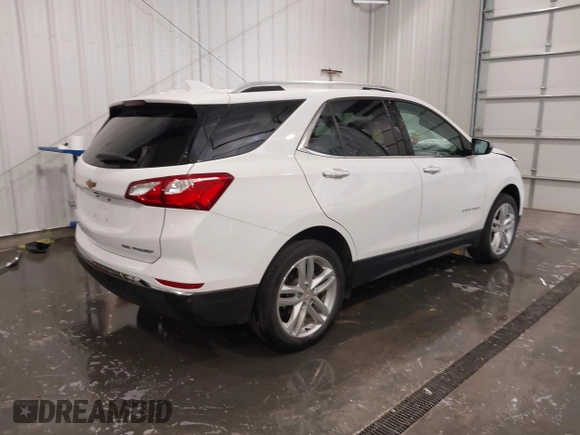 2019 Chevrolet Equinox Premier with VIN 2GNAXXEV3K6265784, listed as a IAAI auction lot 42084939 with 65,933 mi miles and . Bid and sale history available at DreamBid. Image 4.