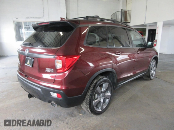 2020 Honda Passport Touring z VIN 5FNYF8H9XLB002041, wystawiony jako Copart lot #78496434 z przebiegiem 39 475 mil mil oraz Szkoda całkowita • Salvage title. Historia ofert i sprzedaży dostępna na DreamBid. Obrazek 3.