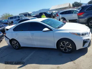 2021 Kia Forte LXS z VIN 3KPF24AD3ME283990, wystawiony jako IAAI lot #41839394 z przebiegiem 66 197 mil mil oraz . Historia ofert i sprzedaży dostępna na DreamBid. Obrazek 13.