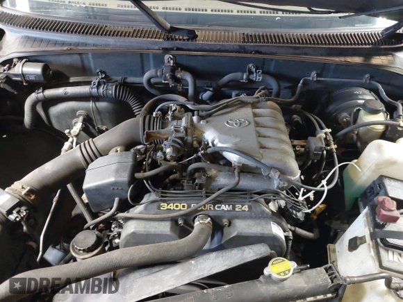 1996 Toyota T100 DX with VIN JT4UN22D2T0020138, listed as a IAAI auction lot 41912550 with 164,007 mi miles. Bid and sale history available at carsss.com. Image 10.