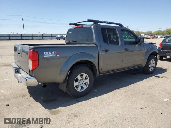 2005 Nissan Frontier LE z VIN 1N6AD07W95C417736, wystawiony jako Copart lot #55112835 z przebiegiem 217 251 mil mil oraz Szkoda całkowita • Salvage title. Historia ofert i sprzedaży dostępna na DreamBid. Obrazek 3.