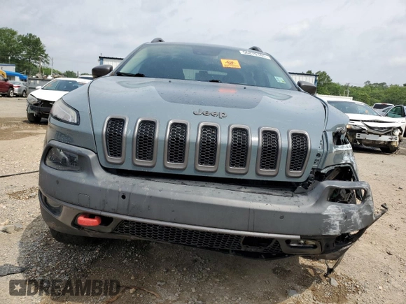 2014 Jeep Cherokee Trailhawk z VIN 1C4PJMBS4EW156550, wystawiony jako Copart lot #56870165 z przebiegiem 100 184 mil mil oraz Szkoda całkowita • Salvage title. Historia ofert i sprzedaży dostępna na DreamBid. Obrazek 5.