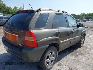 2005 Kia Sportage LX with VIN KNDJF723557133872, listed as a IAAI auction lot 42203702 with 181,132 mi miles and . Bid and sale history available at carsss.com. Image 4.