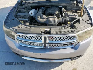 2013 Dodge Durango SXT z VIN 1C4RDHAGXDC697865, wystawiony jako Copart lot #52635305 z przebiegiem 206 980 mil mil oraz Czysty tytuł • Clean title. Historia ofert i sprzedaży dostępna na DreamBid. Obrazek 12.