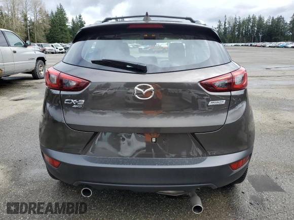 2017 Mazda CX-3 Touring with VIN JM1DKFC79H0148103, listed as a Copart auction lot 51343025 with 79,765 mi miles and Salvage Title. Bid and sale history available at DreamBid. Image 6.