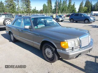 1989 Mercedes-Benz 300 300SE z VIN WDBCA24DXKA437857, wystawiony jako IAAI lot #42343496 z przebiegiem 152 134 mil mil oraz . Historia ofert i sprzedaży dostępna na DreamBid. Obrazek 1.