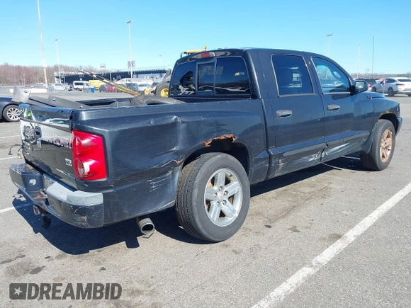 2007 Dodge Dakota SLT z VIN 1D7HW48JX7S196121, wystawiony jako IAAI lot #41863734 z przebiegiem 148 720 mil mil oraz . Historia ofert i sprzedaży dostępna na DreamBid. Obrazek 4.