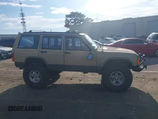 1995 Jeep Cherokee Sport with VIN 1J4FJ68S3SL555908, listed as a IAAI auction lot 42222016 with 283,444 mi miles and . Bid and sale history available at DreamBid. Image 13.