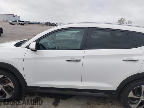 2016 Hyundai Tucson Limited with VIN KM8J33A2XGU037231, listed as a IAAI auction lot 42096501 with 151,912 mi miles and . Bid and sale history available at DreamBid. Image 14.