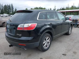 2011 Mazda CX-9 Touring with VIN JM3TB3CV0B0331123, listed as a IAAI auction lot 42260158 with 130,411 mi miles and . Bid and sale history available at DreamBid. Image 4.