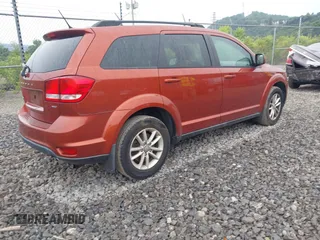 2013 Dodge Journey SXT with VIN 3C4PDDBG8DT510402, listed as a IAAI auction lot 42738111 with 107,786 mi miles and . Bid and sale history available at DreamBid. Image 4.