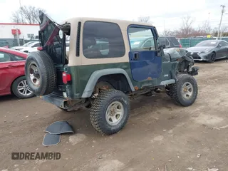 1997 Jeep Wrangler SE with VIN 1J4FY29PXVP406939, listed as a IAAI auction lot 41612380 with 248,314 mi miles. Bid and sale history available at carsss.com. Image 4.