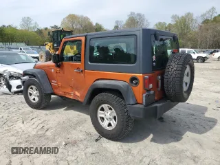 2011 Jeep Wrangler Sport with VIN 1J4AA2D15BL574234, listed as a Copart auction lot 52952605 with 114,642 mi miles and Salvage Title. Bid and sale history available at carsss.com. Image 2.