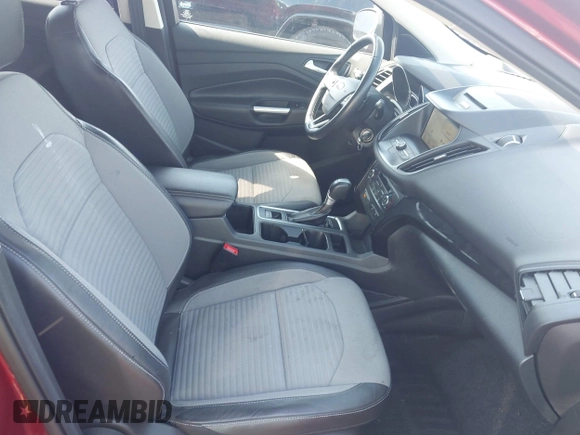 2017 Ford Escape SE z VIN 1FMCU9GD4HUA10240, wystawiony jako IAAI lot #42392522 z przebiegiem 82 325 mil mil oraz . Historia ofert i sprzedaży dostępna na DreamBid. Obrazek 5.