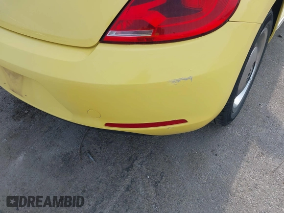 2013 Volkswagen Beetle with VIN 3VWHX7AT0DM603661, listed as a IAAI auction lot 42464030 with 95,159 mi miles and . Bid and sale history available at DreamBid. Image 18.